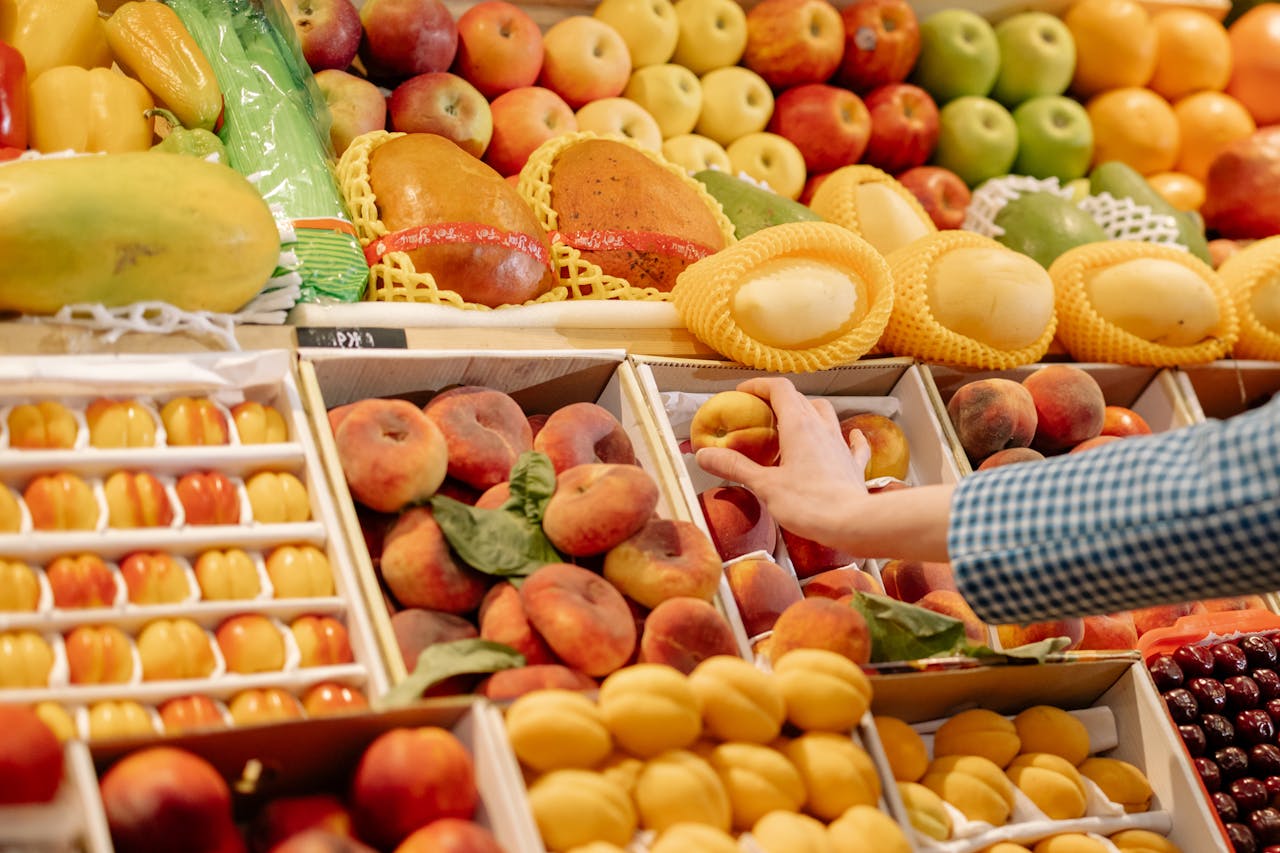 A Person Holding a Fruit